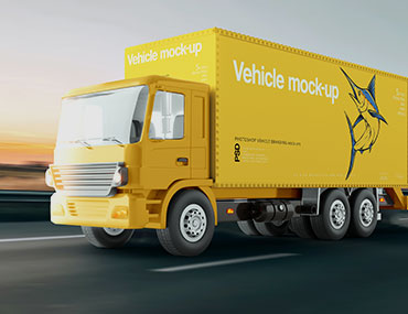 Yellow truck on the road | Freight Services